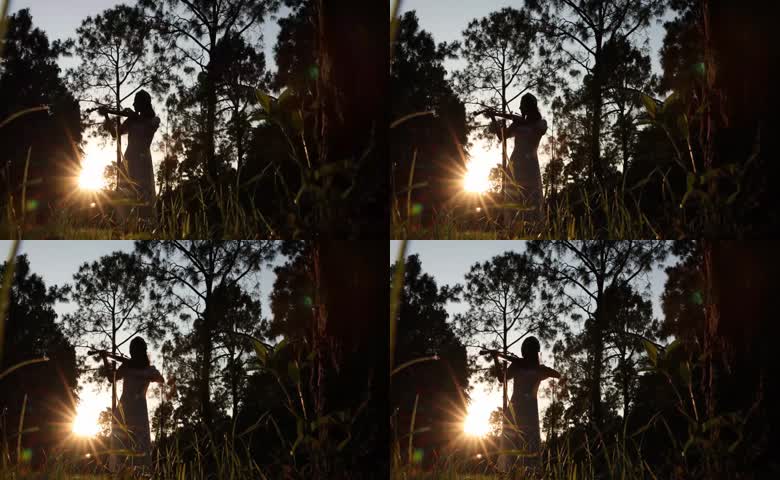 小提琴户外演奏夕阳美景