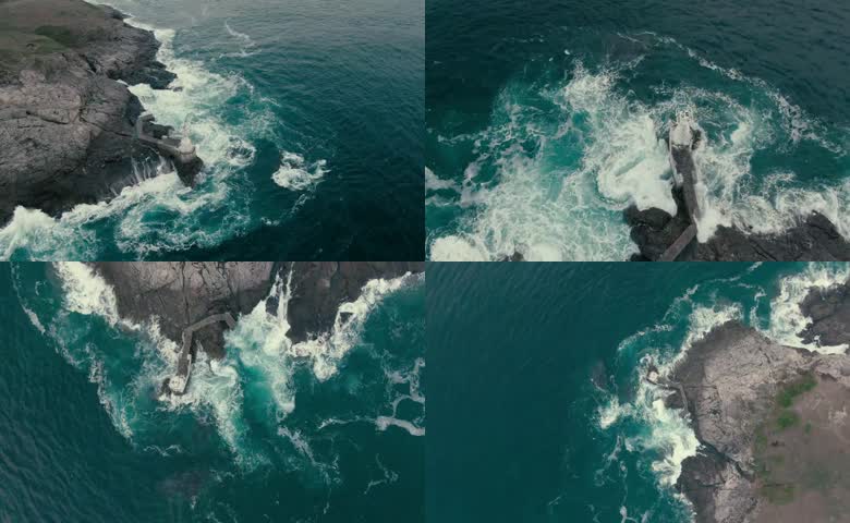 海边悬崖礁石灯塔海浪航拍