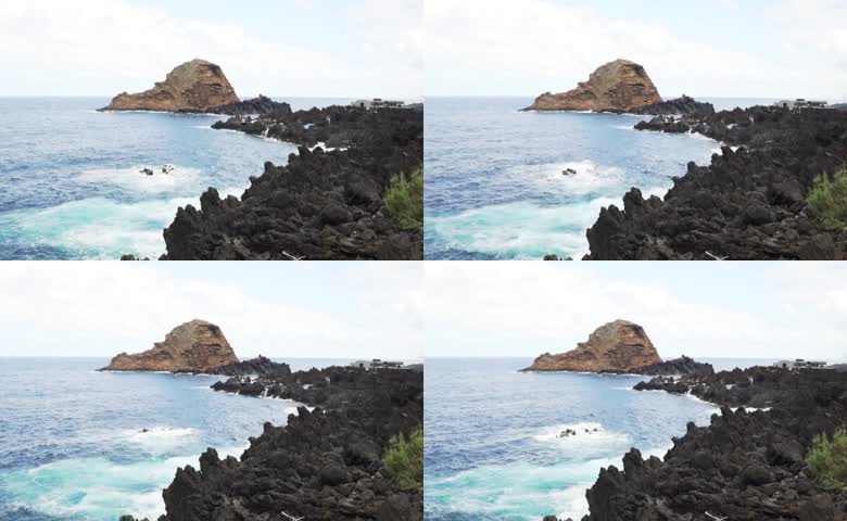 海浪拍打熔岩礁石