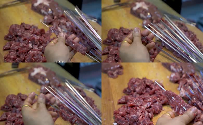 生鲜肉块穿成烤串