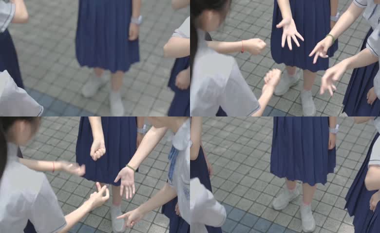 女学生玩石头剪刀布