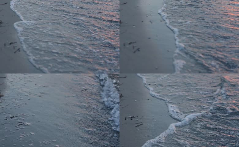 海浪轻拂下的静谧沙滩
