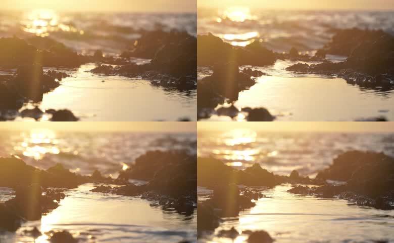 海边礁石日落风光