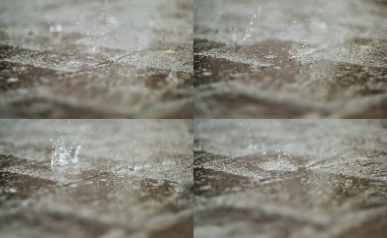 雨水打在地面慢镜头