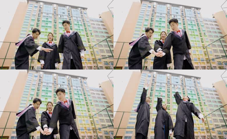 大学毕业生搭手挥手欢呼实拍