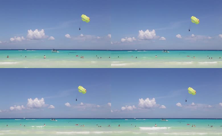 大海海洋海岸滑翔伞游泳