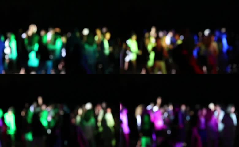 虚焦夜景户外庆祝人群