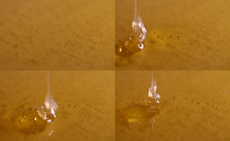 倾倒金色粘稠蜂蜜