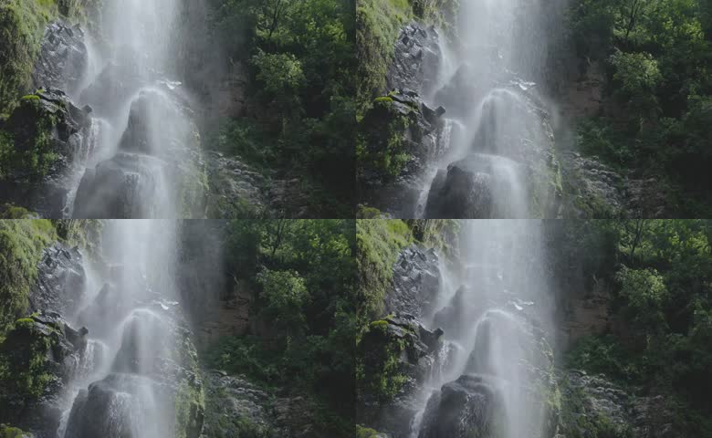 山间岩石林间飞瀑风景