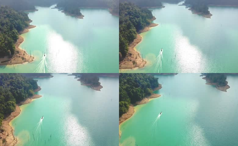 航拍山林间碧绿湖泊水库