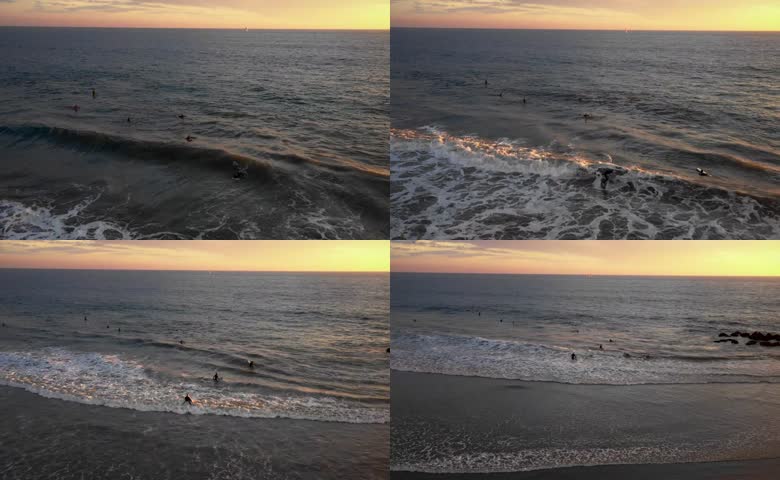 夕阳大海冲浪运动
