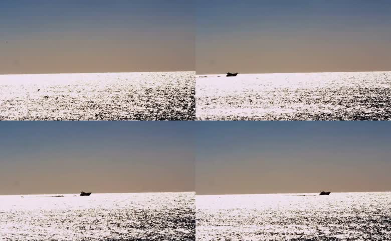 海面波光孤舟远影