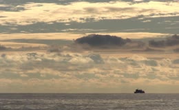夕阳海洋大海航船航行延时