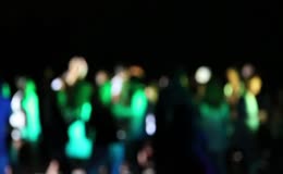 虚焦夜景户外庆祝人群