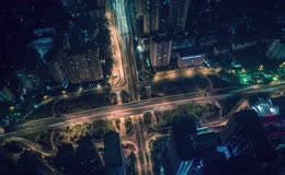 航拍夜晚十字路口车水马龙延时